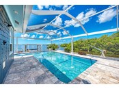 Spectacular infinity pool views - Single Family Home for sale at 949 Suncrest Ln, Englewood, FL 34223 - MLS Number is D6120396