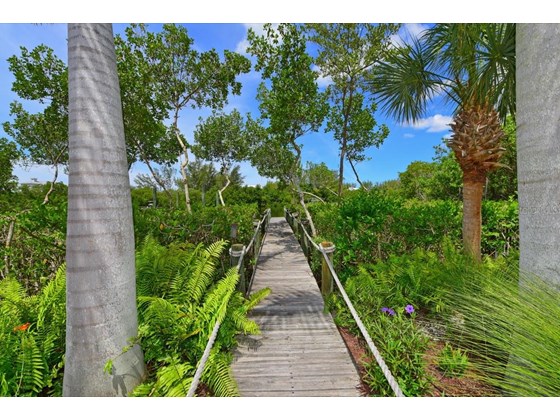 Walkway to Dock - Single Family Home for sale at 631 Bocilla Dr, Placida, FL 33946 - MLS Number is D6122145