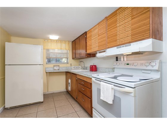 Kitchen in Lower Rental Unit - Duplex/Triplex for sale at 4076 N Beach Rd #10 & 11, Englewood, FL 34223 - MLS Number is D6122744