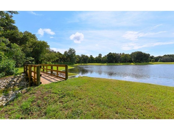 Single Family Home for sale at 1049 River Wind Cir, Bradenton, FL 34212 - MLS Number is T3342183