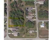 Highlighted area is the approximate outline of lots 873 & 875 - Vacant Land for sale at 873 & 875 Boundary Blvd, Rotonda West, FL 33947 - MLS Number is O5987660