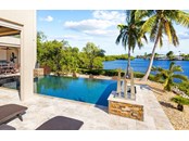 Saltwater gas heated pool overlooking bay - Single Family Home for sale at 2755 Cussell Dr, Saint James City, FL 33956 - MLS Number is C7451799