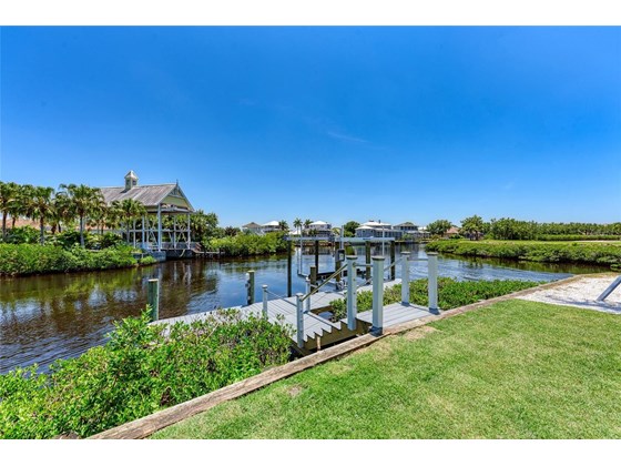 Dock and stairs are made with Trex decking, steel and cable railing. 24,000 lb. boat lift. - Single Family Home for sale at 602 Regatta Way, Bradenton, FL 34208 - MLS Number is A4499642