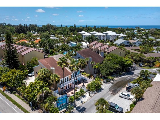 Nestled in a community of private resorts, condos, and time shares. - Condo for sale at 6810 Midnight Pass Rd, Sarasota, FL 34242 - MLS Number is A4507853