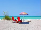 Chaise on the beach with umbrella - Single Family Home for sale at 6211 Gulf Of Mexico Dr, Longboat Key, FL 34228 - MLS Number is A4511733