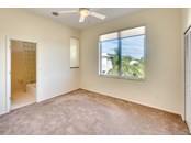 bedroom 2 with adjoining bath - Single Family Home for sale at 113 N Polk Dr, Sarasota, FL 34236 - MLS Number is A4514338