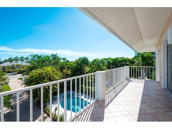 bedroom 3 and 4 balcony - Single Family Home for sale at 113 N Polk Dr, Sarasota, FL 34236 - MLS Number is A4514338