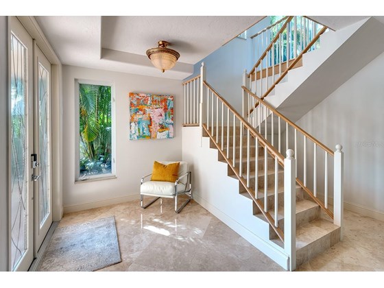Formal greeting area, elevator to 2nd and third floor is to the left. - Single Family Home for sale at 113 N Polk Dr, Sarasota, FL 34236 - MLS Number is A4514338