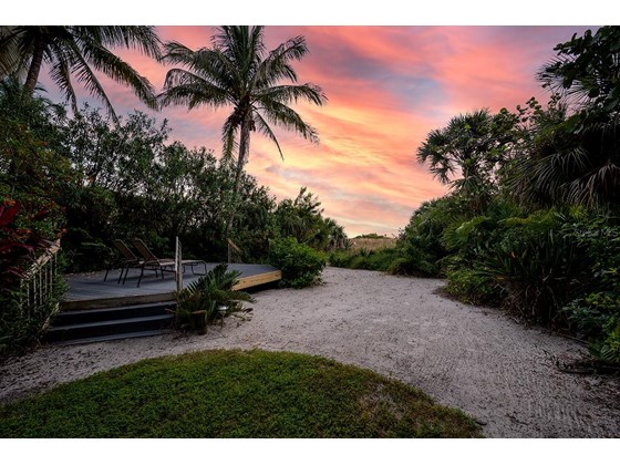 Sunset from the backyard - Single Family Home for sale at 113 N Polk Dr, Sarasota, FL 34236 - MLS Number is A4514338