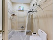 Owner's walk-in closet - Single Family Home for sale at 5227 Siesta Cove Dr, Sarasota, FL 34242 - MLS Number is A4519271