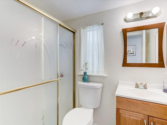 First floor bathroom - Single Family Home for sale at 5227 Siesta Cove Dr, Sarasota, FL 34242 - MLS Number is A4519271
