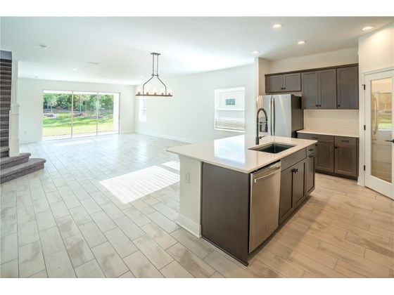 Kitchen has Stainless Appliances - Single Family Home for sale at 13181 Steinhatchee Loop, Venice, FL 34293 - MLS Number is A4519994
