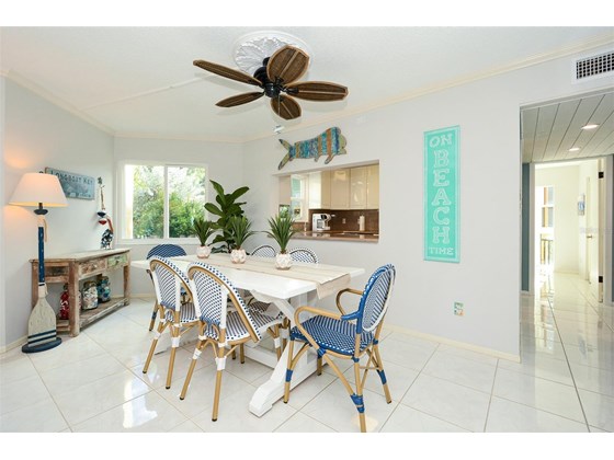 Dining with pass through to kitchen - Condo for sale at 450 Gulf Of Mexico Dr #B107, Longboat Key, FL 34228 - MLS Number is A4520786