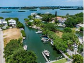 Community Marina with Deeded Dock Slips...This property has two slips with power and water available. - Single Family Home for sale at 1460 Rebecca Ln, Sarasota, FL 34231 - MLS Number is N6115705